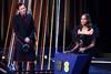 Zoe Saldaña accepts the supporting actress award for 'Emilia Pérez' on stage during the Bafta Film Awards 2025