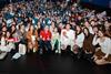Director Thu Trang (front row, green trousers) attends a Beta Cinemas screening of her film Monkey Kisses